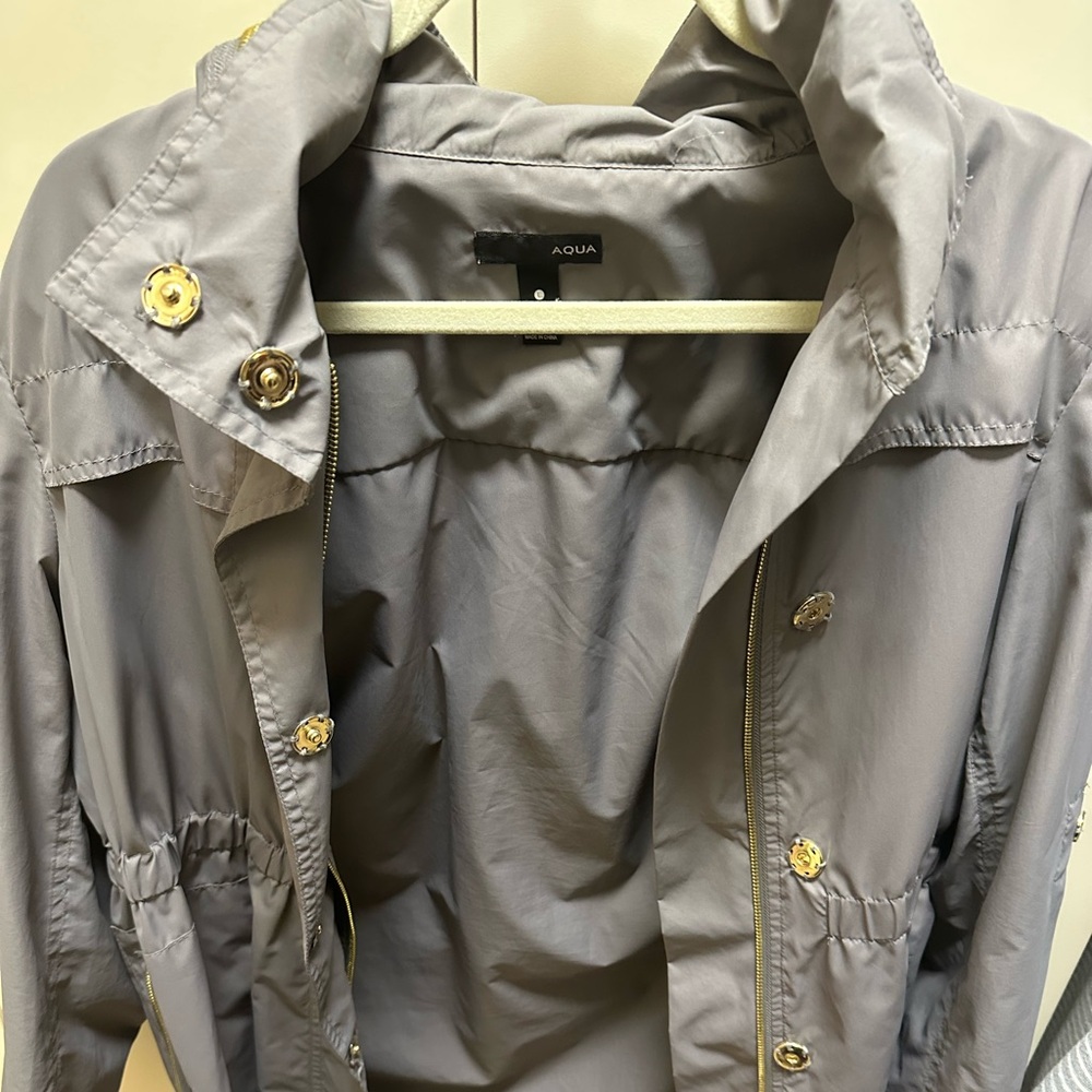 Aqua taupe rain coat stylish chic with gold zipper